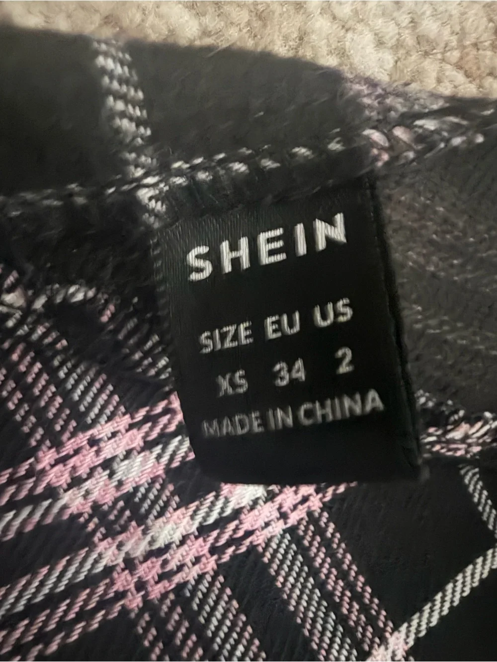 SHEIN Black Plaid Mini Skirt with Pink Accents